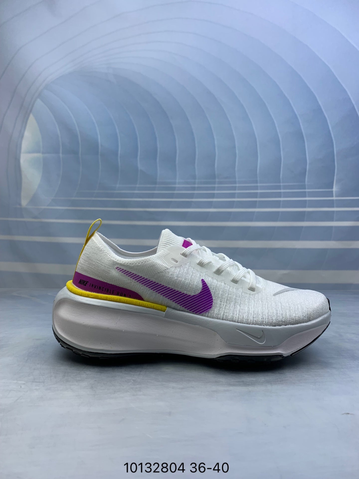 Nike Invincible 3.- blancas y moradas