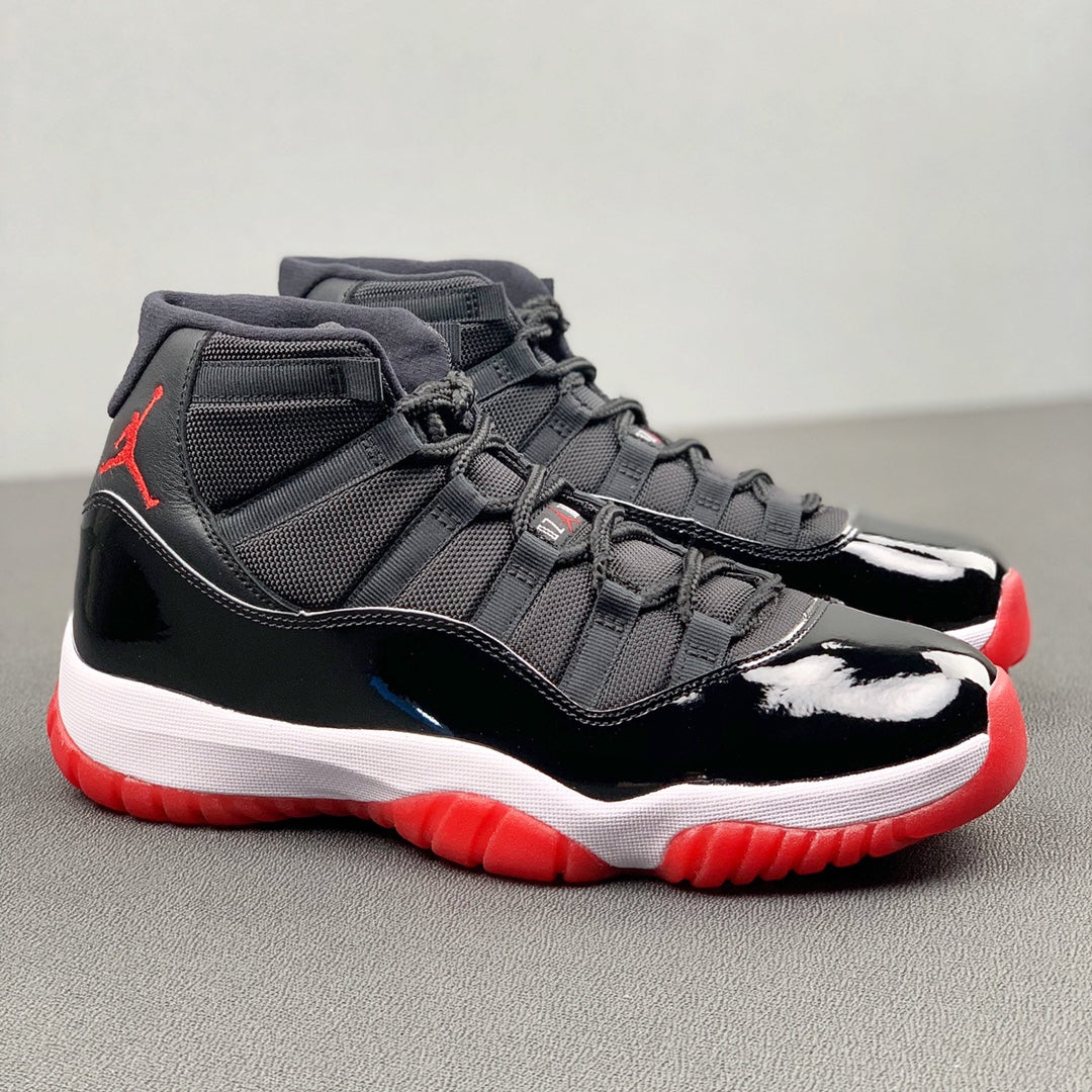 Air Jordan 11 "Bred" .- rojas y negras