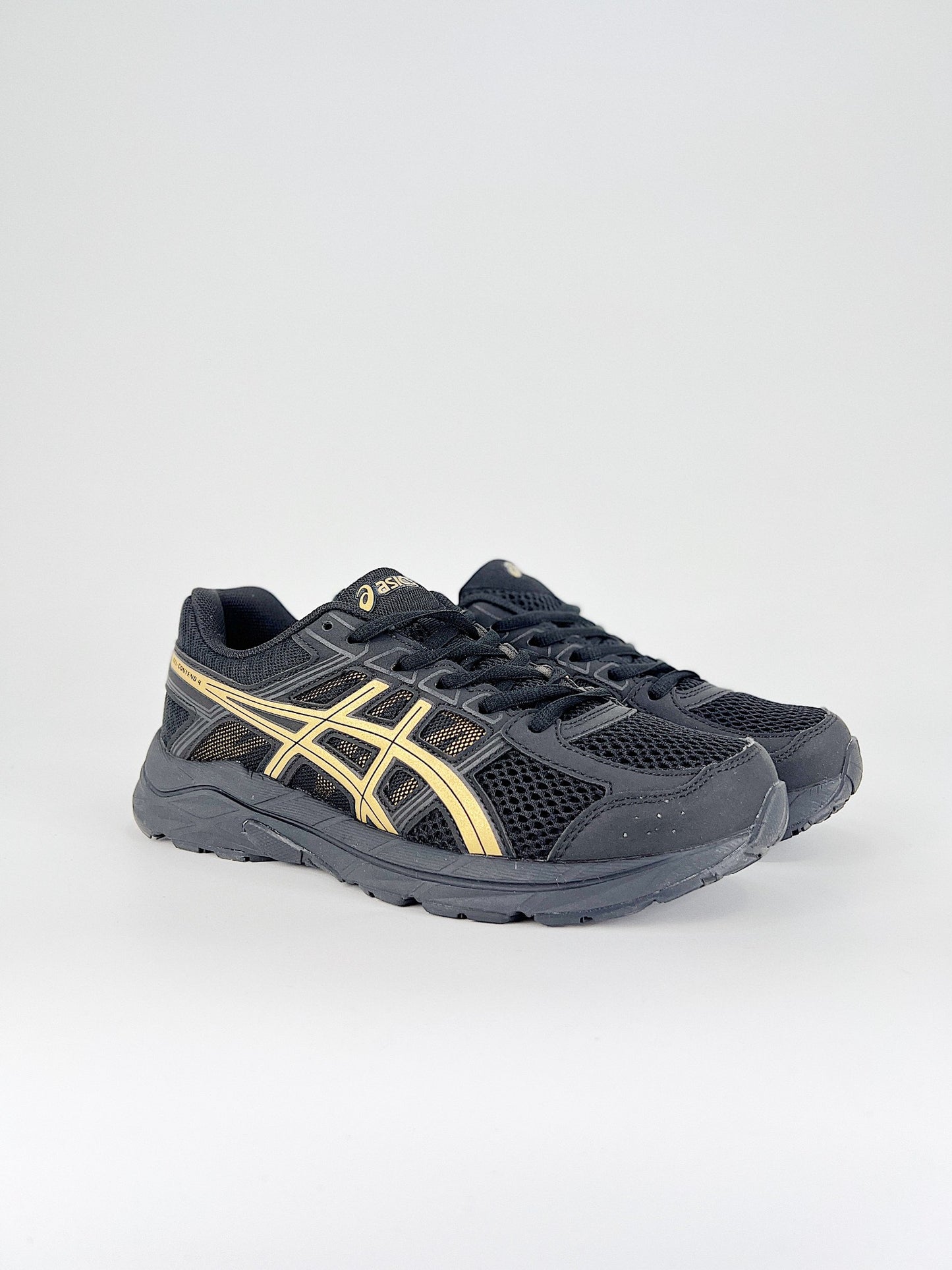 Asics Gel.- negras y amarillas