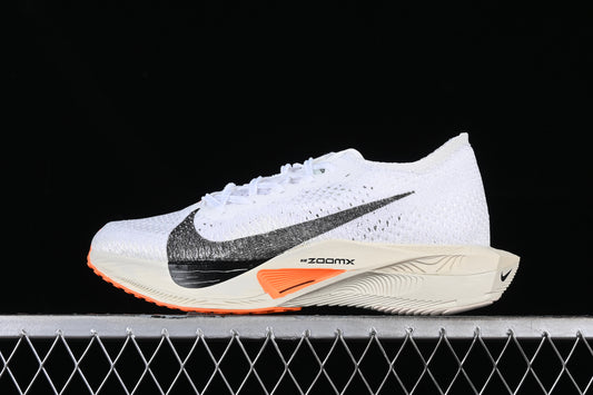 Nike ZoomX Vaporfly NEXT% 3.- blancas negras y naranjas