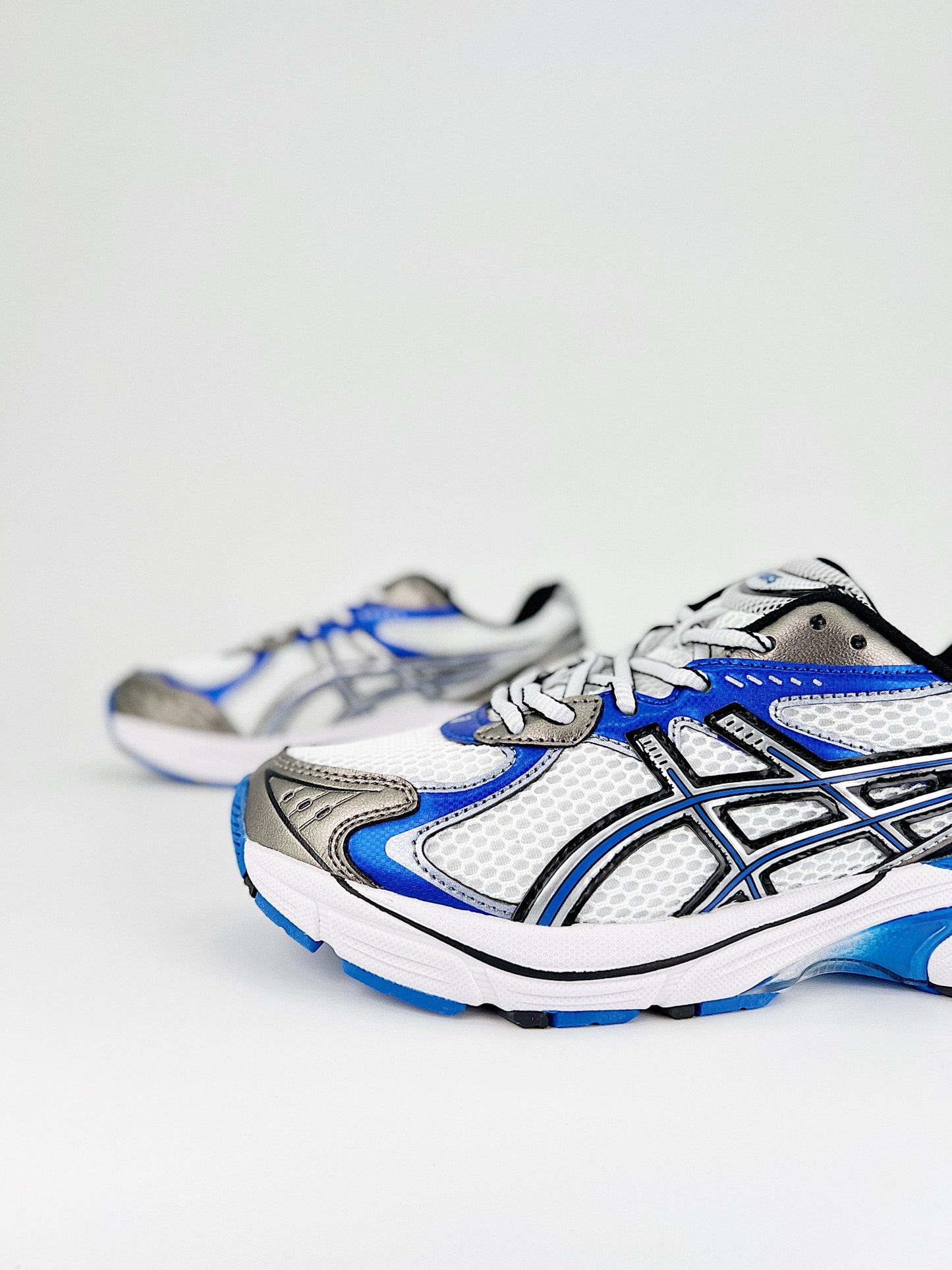 Asics GT-2160.- blancas, azules y negras