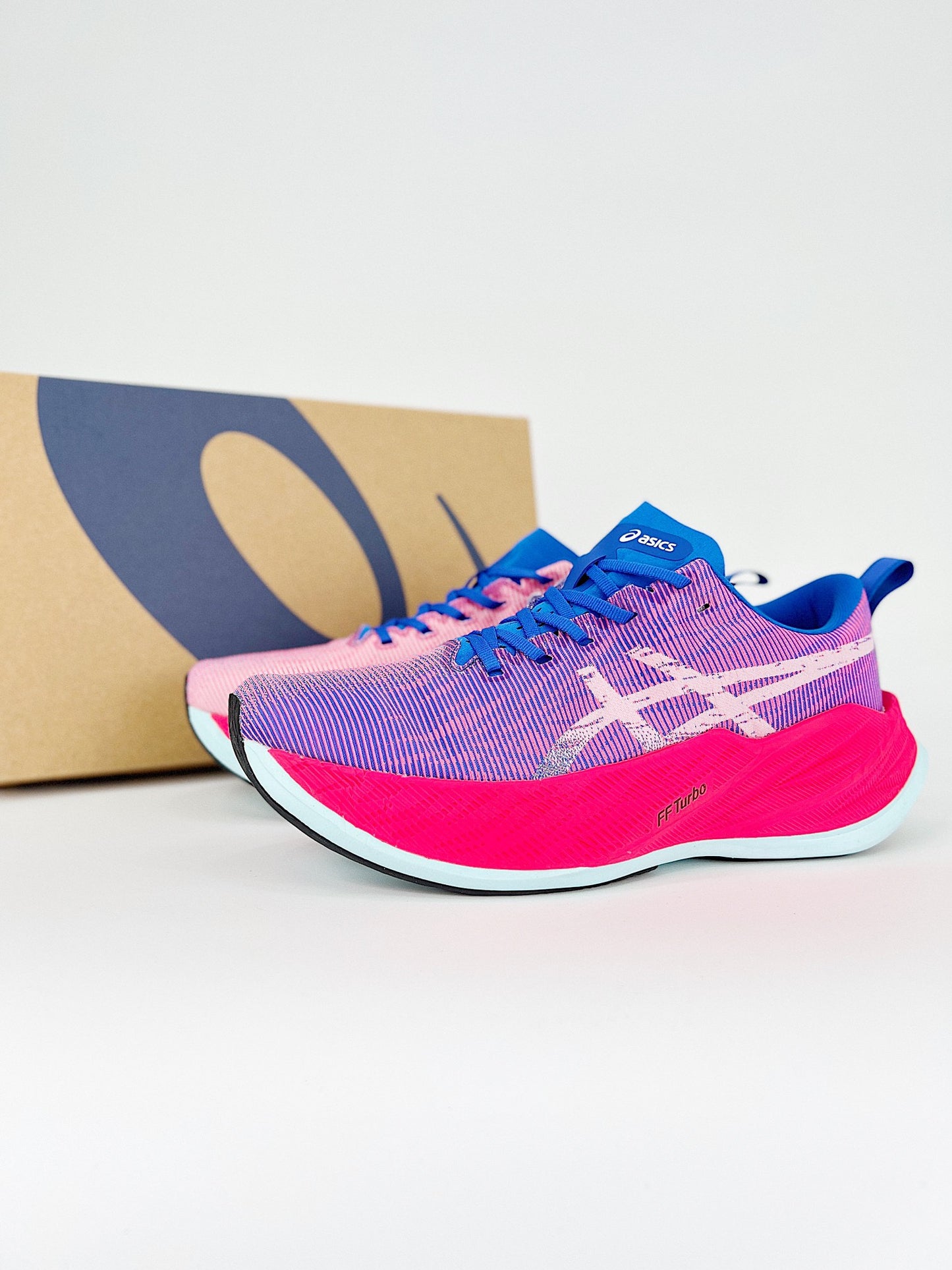 Asics Superblast.- rosas y moradas