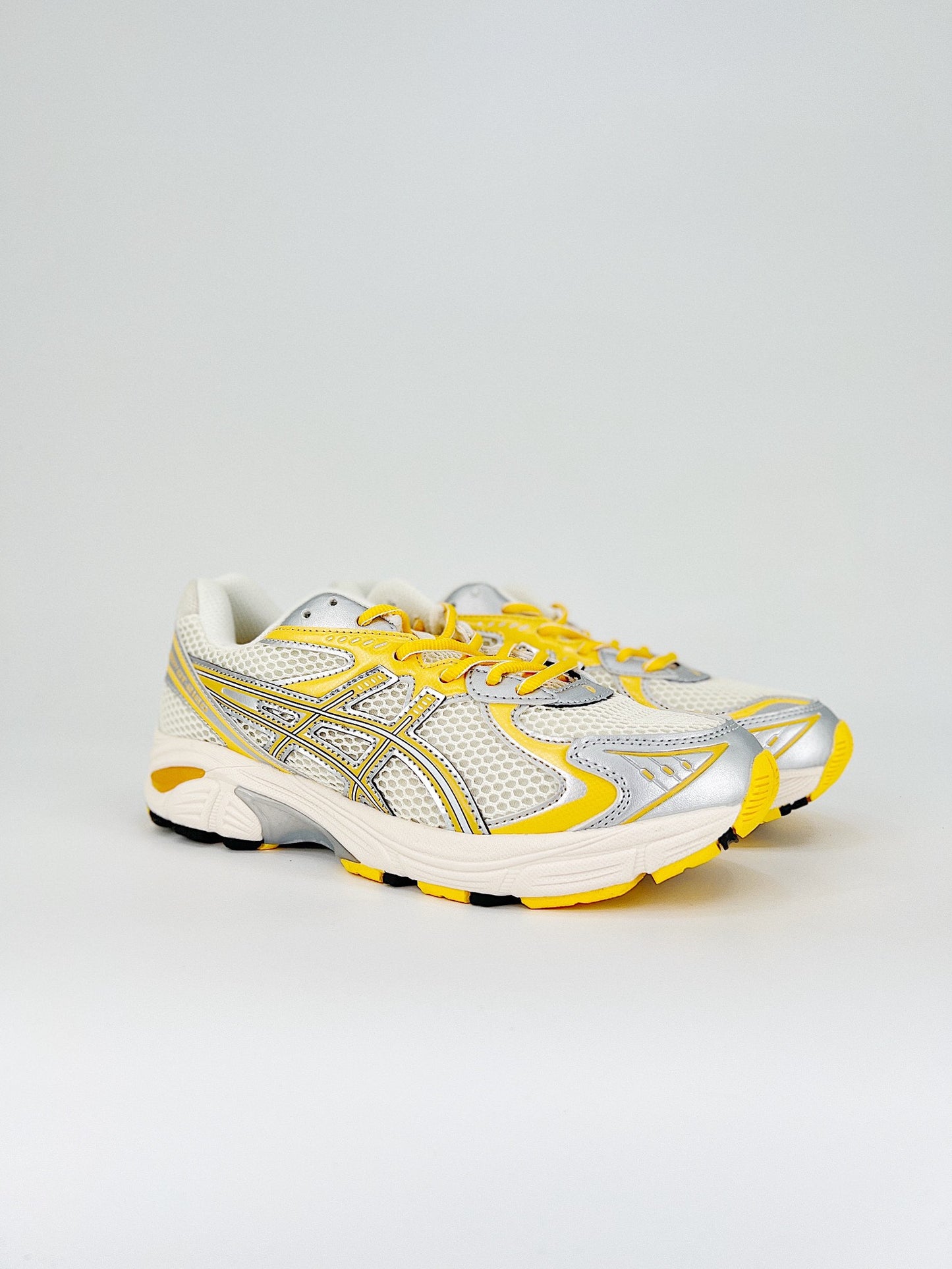 Asics GT-2160.- blancas y amarillas