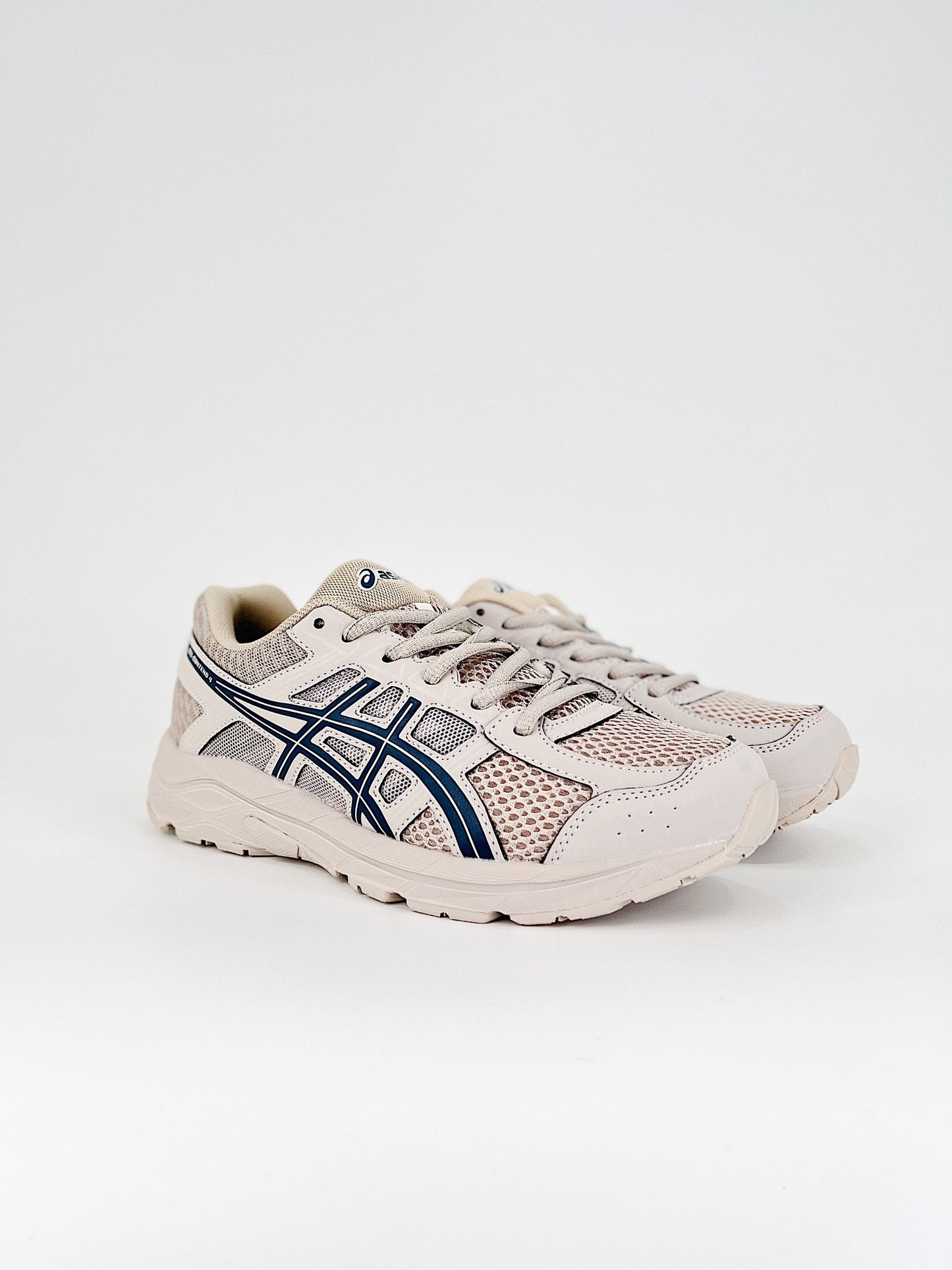 Asics Gel.- beige y negras