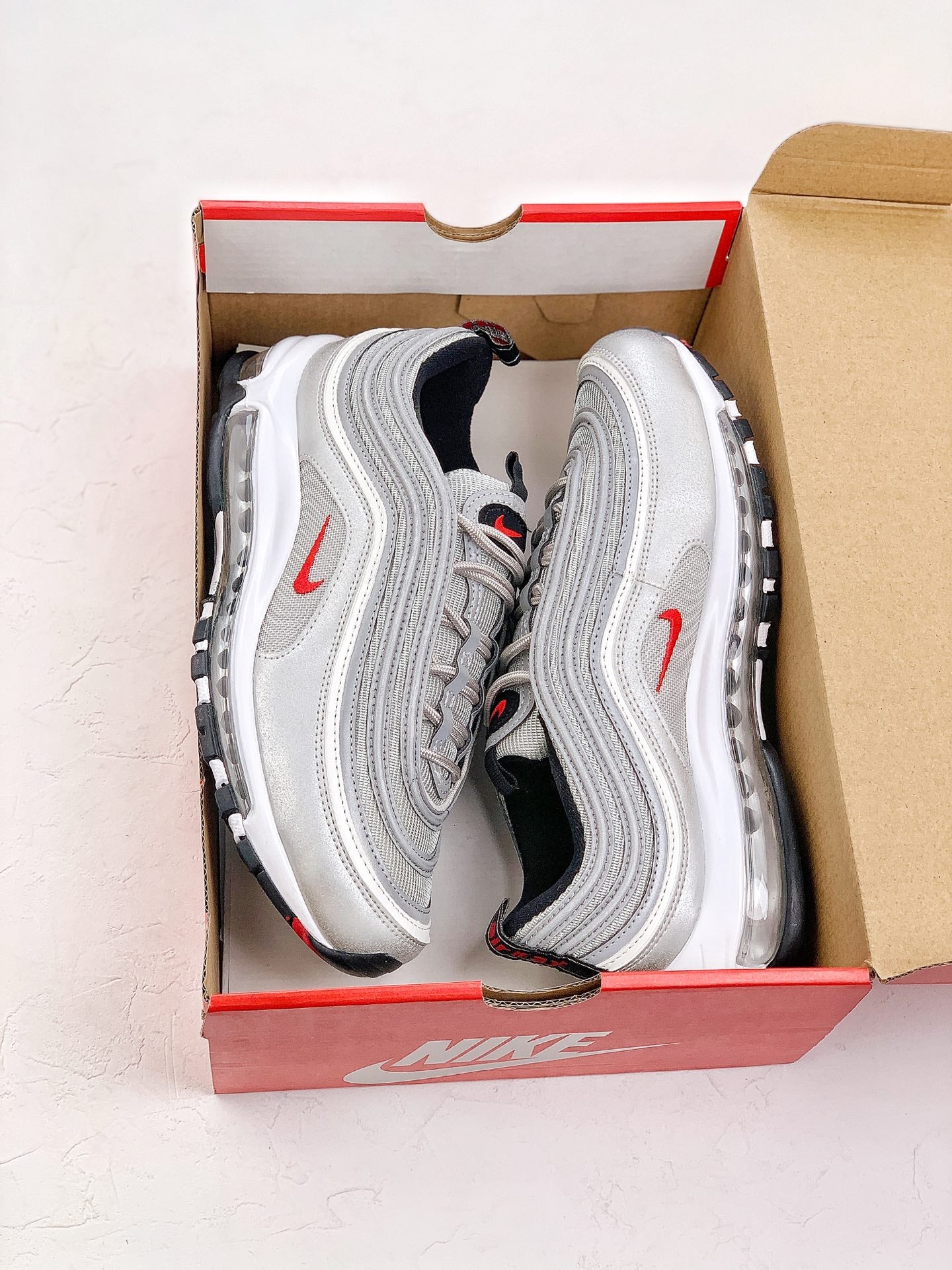 Nike Air Max 97.- grises