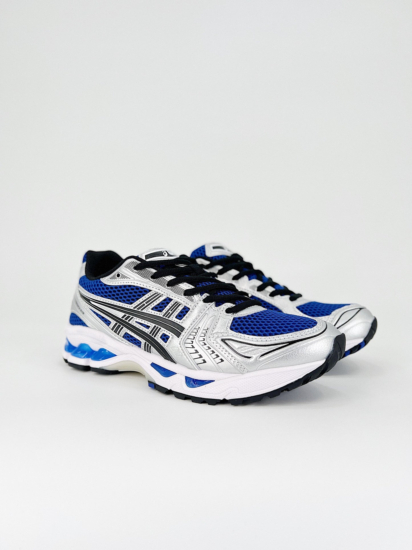 ASICS GEL-KAYANO 14.- negras y azules