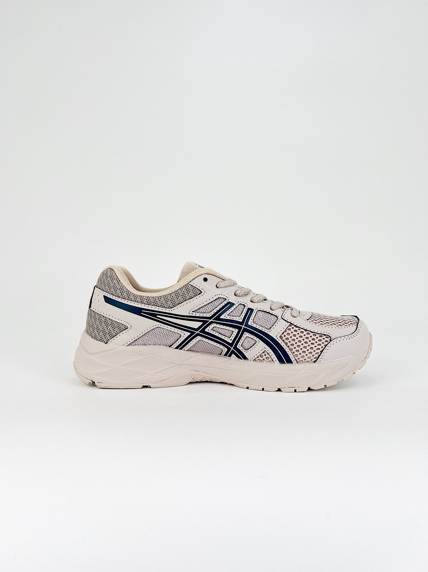 Asics Gel.- beige y negras