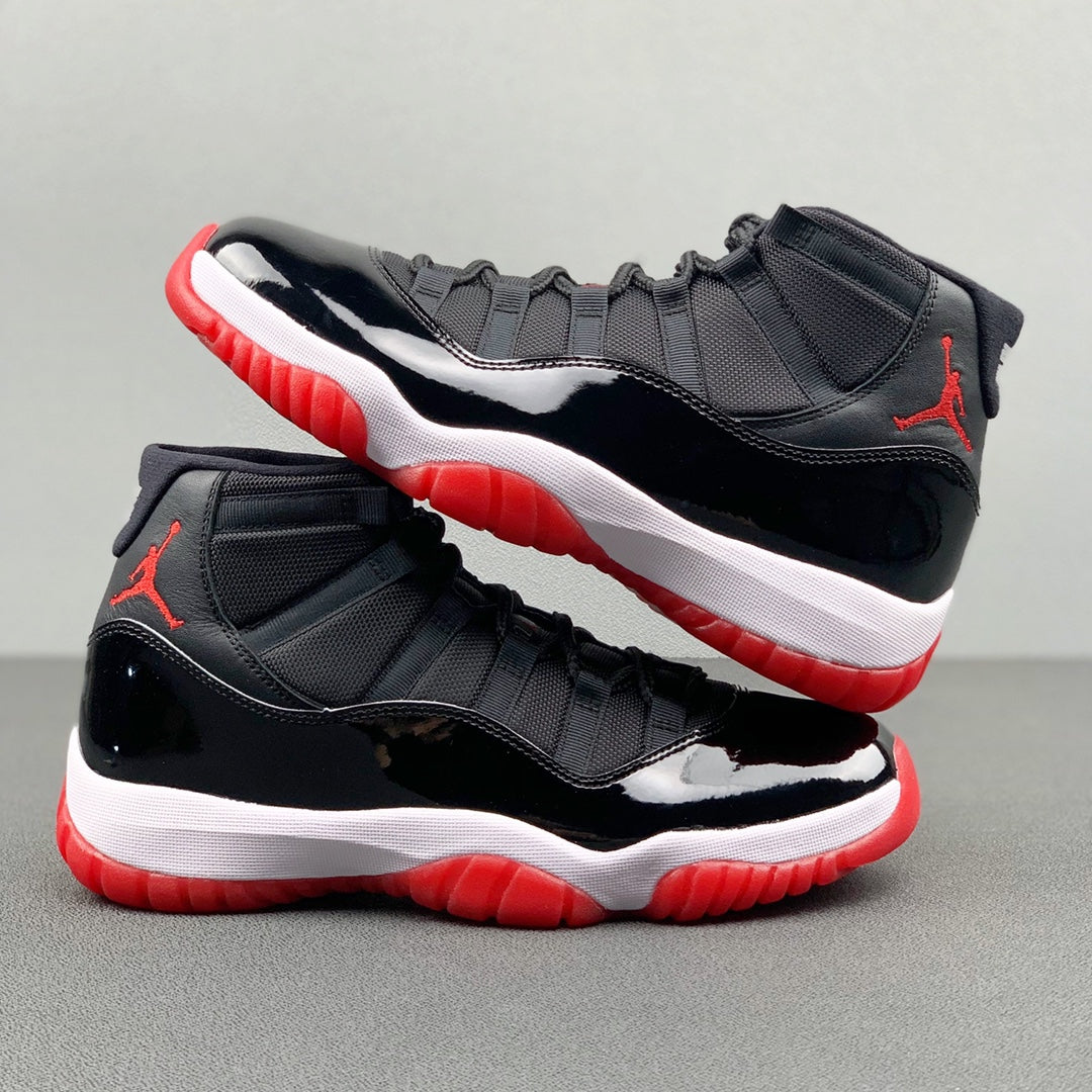 Air Jordan 11 "Bred" .- rojas y negras