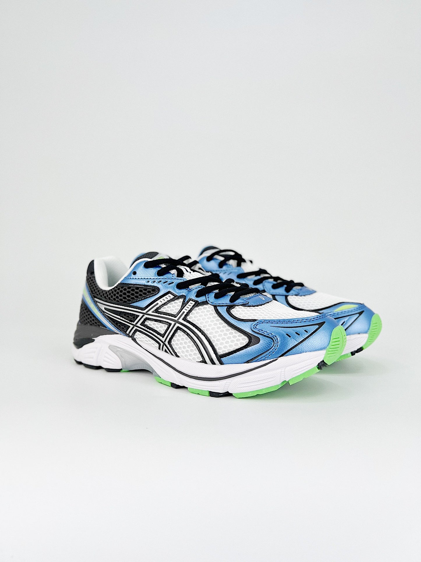 Asics GT-2160.- blancas, negras y azules