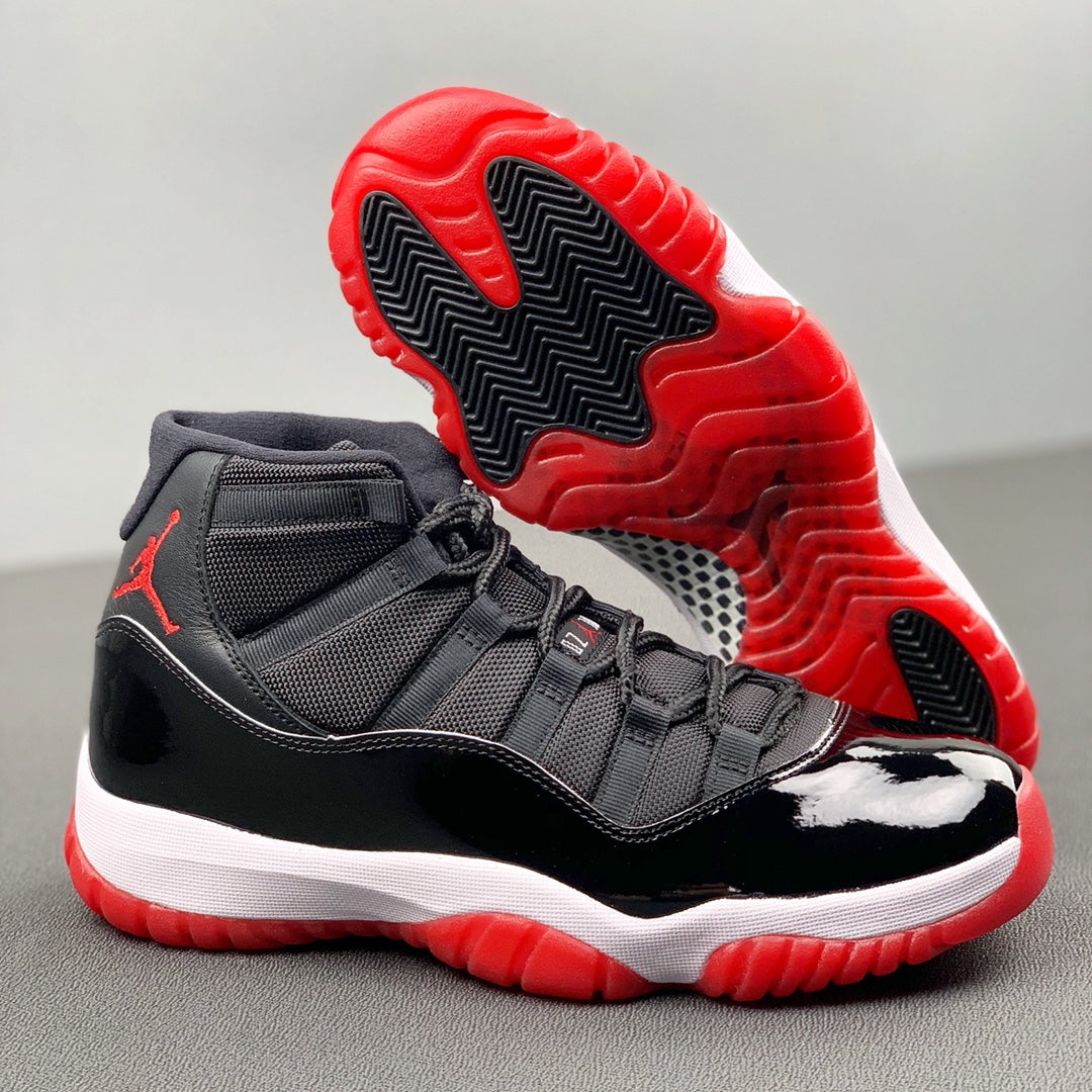 Air Jordan 11 "Bred" .- rojas y negras