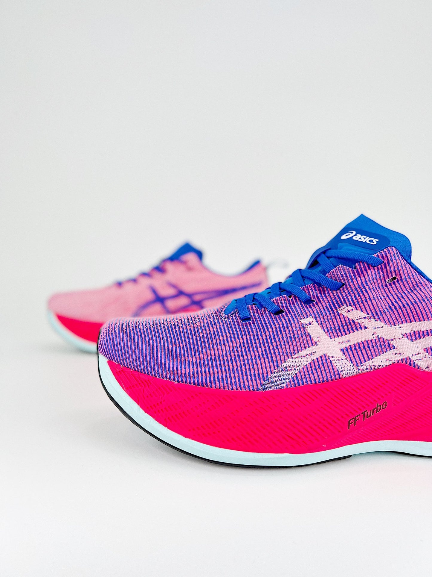 Asics Superblast.- rosas y moradas