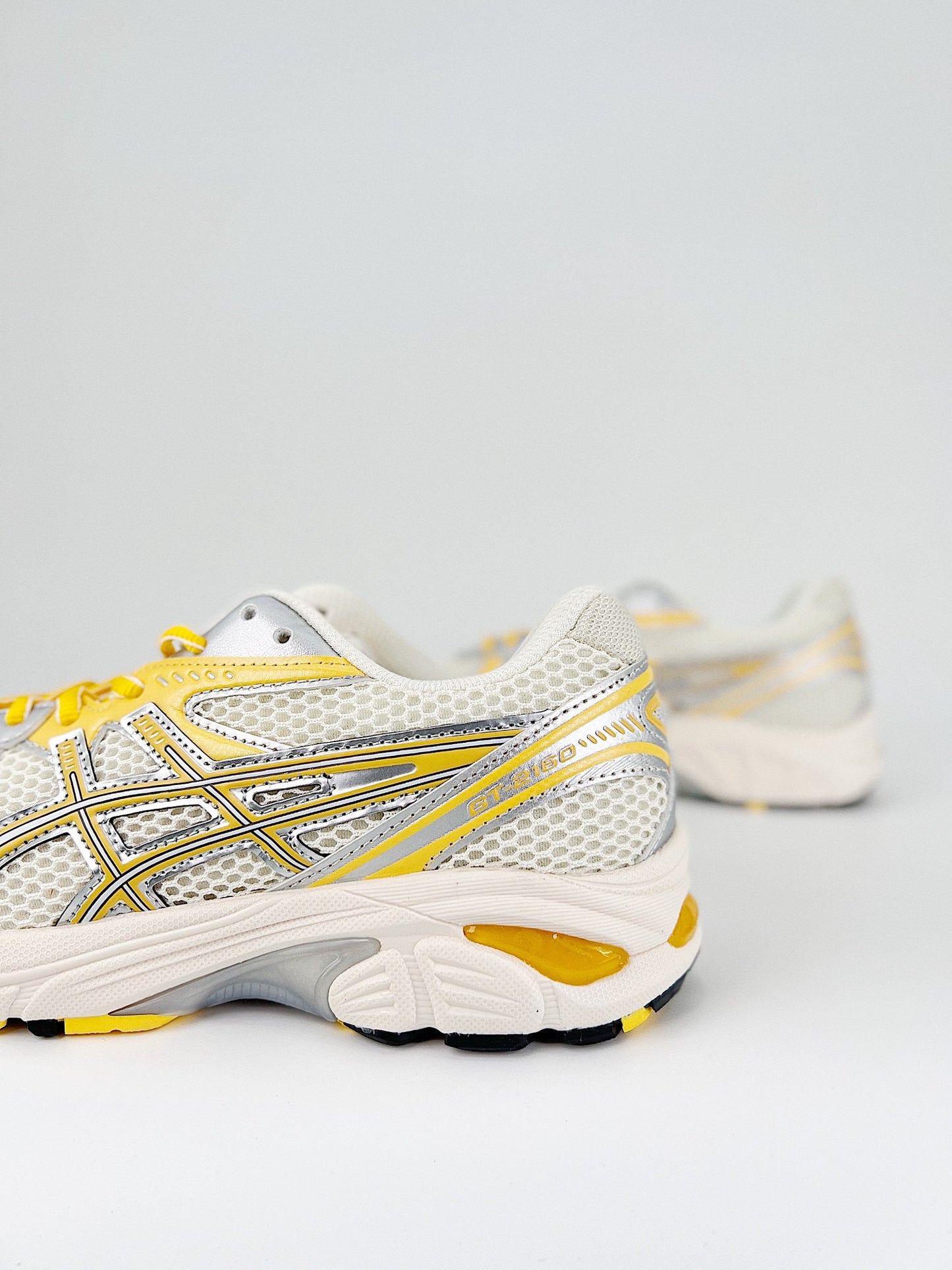 Asics GT-2160.- blancas y amarillas