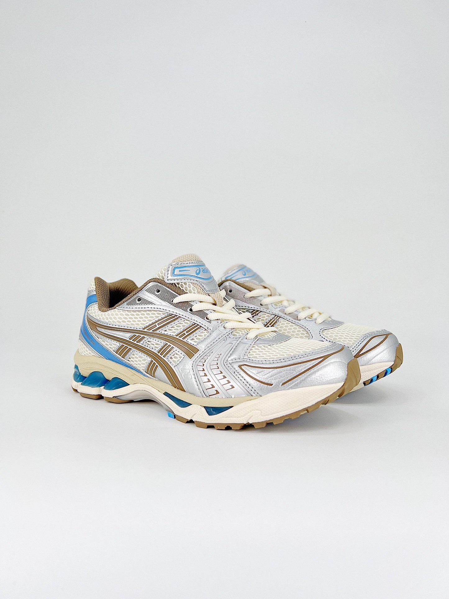 ASICS GEL-KAYANO 14.- marrones y azules