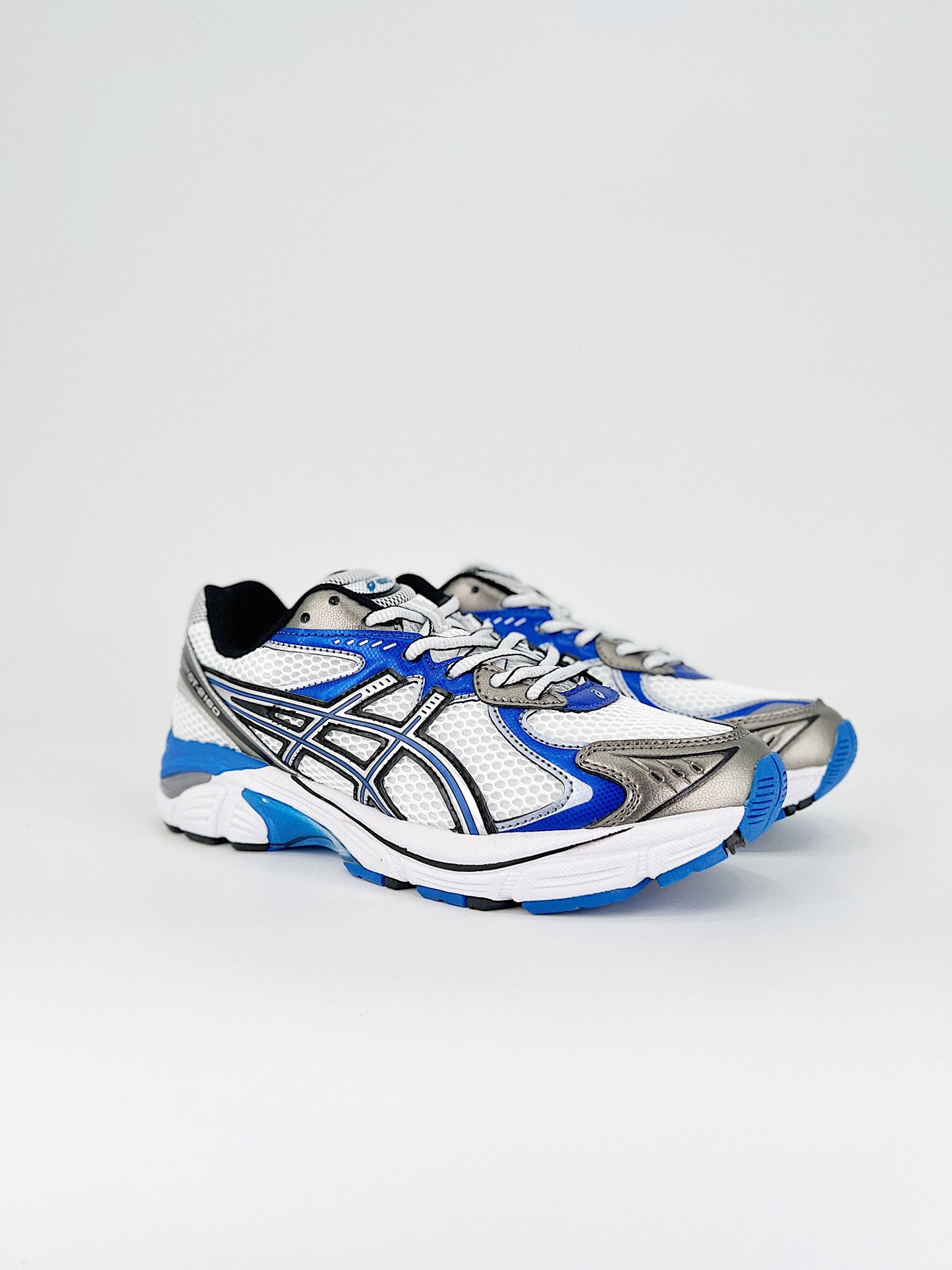 Asics GT-2160.- blancas, azules y negras