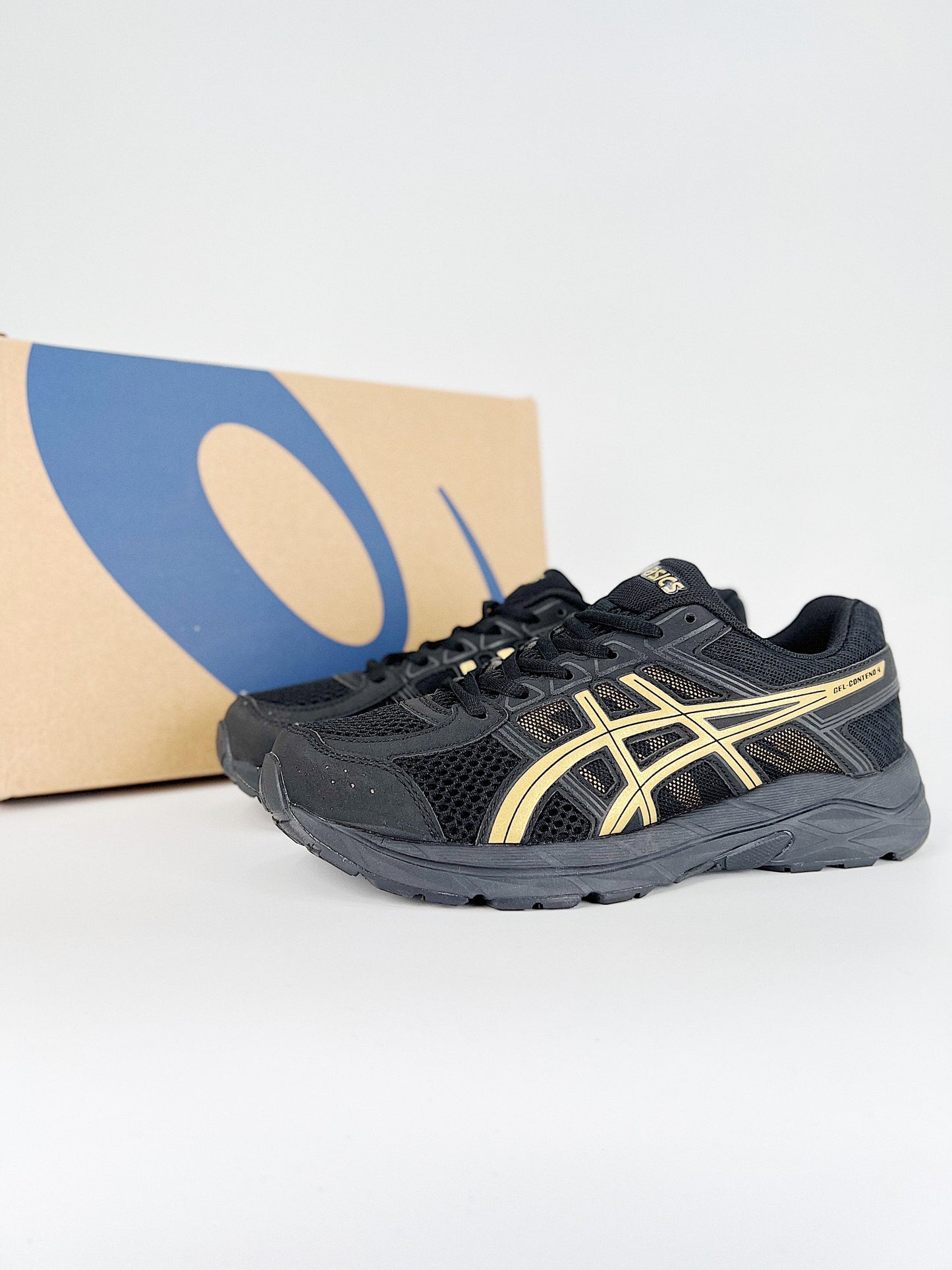 Asics Gel.- negras y amarillas