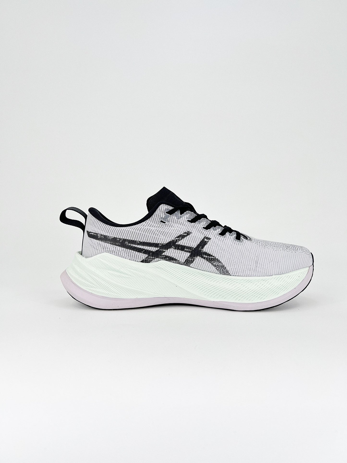 Asics Superblast.- blancas, grises y negras