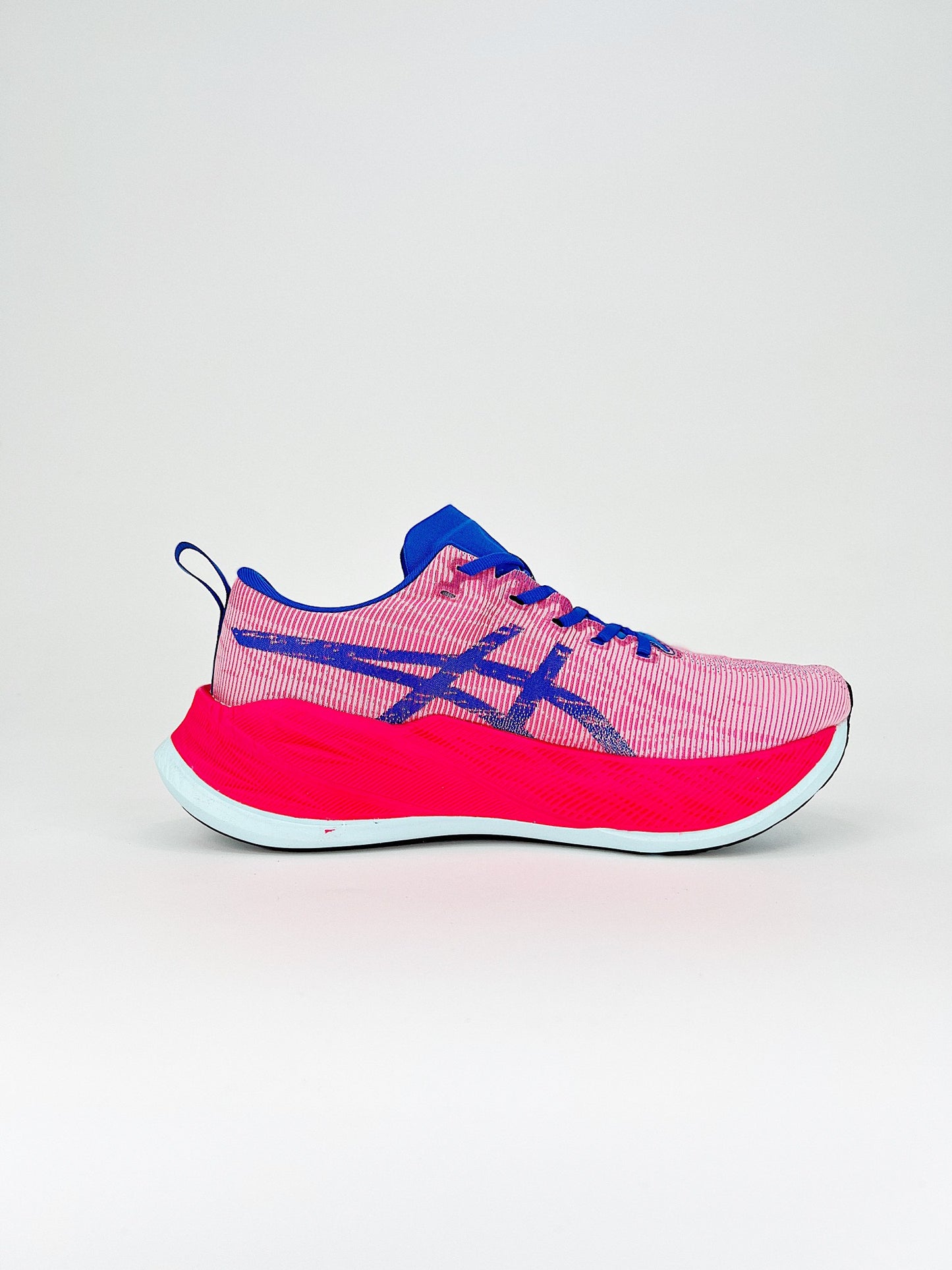 Asics Superblast.- rosas y moradas