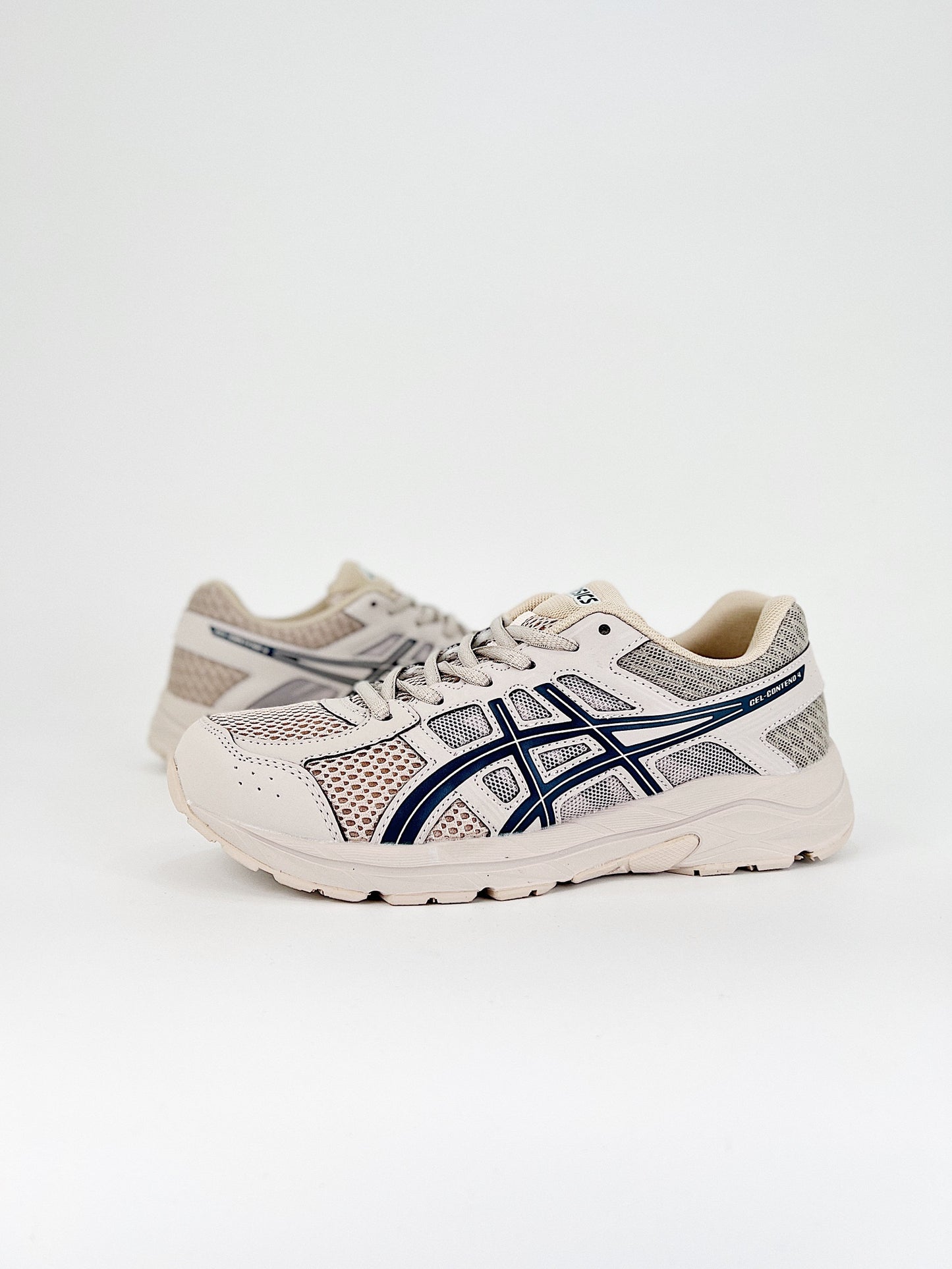 Asics Gel.- beige y negras