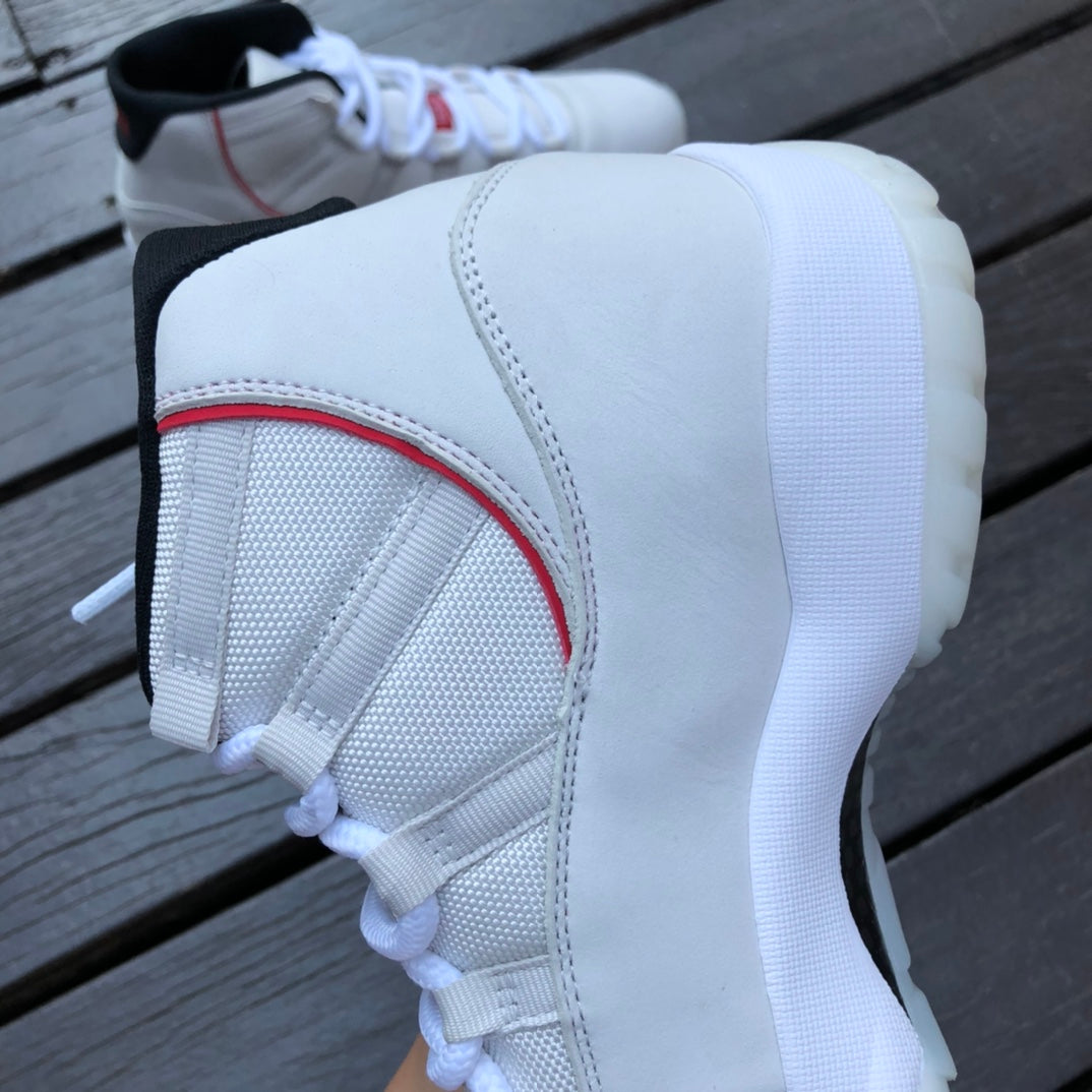 Air Jordan 11 Platinum Tint "Bugs Bunny"