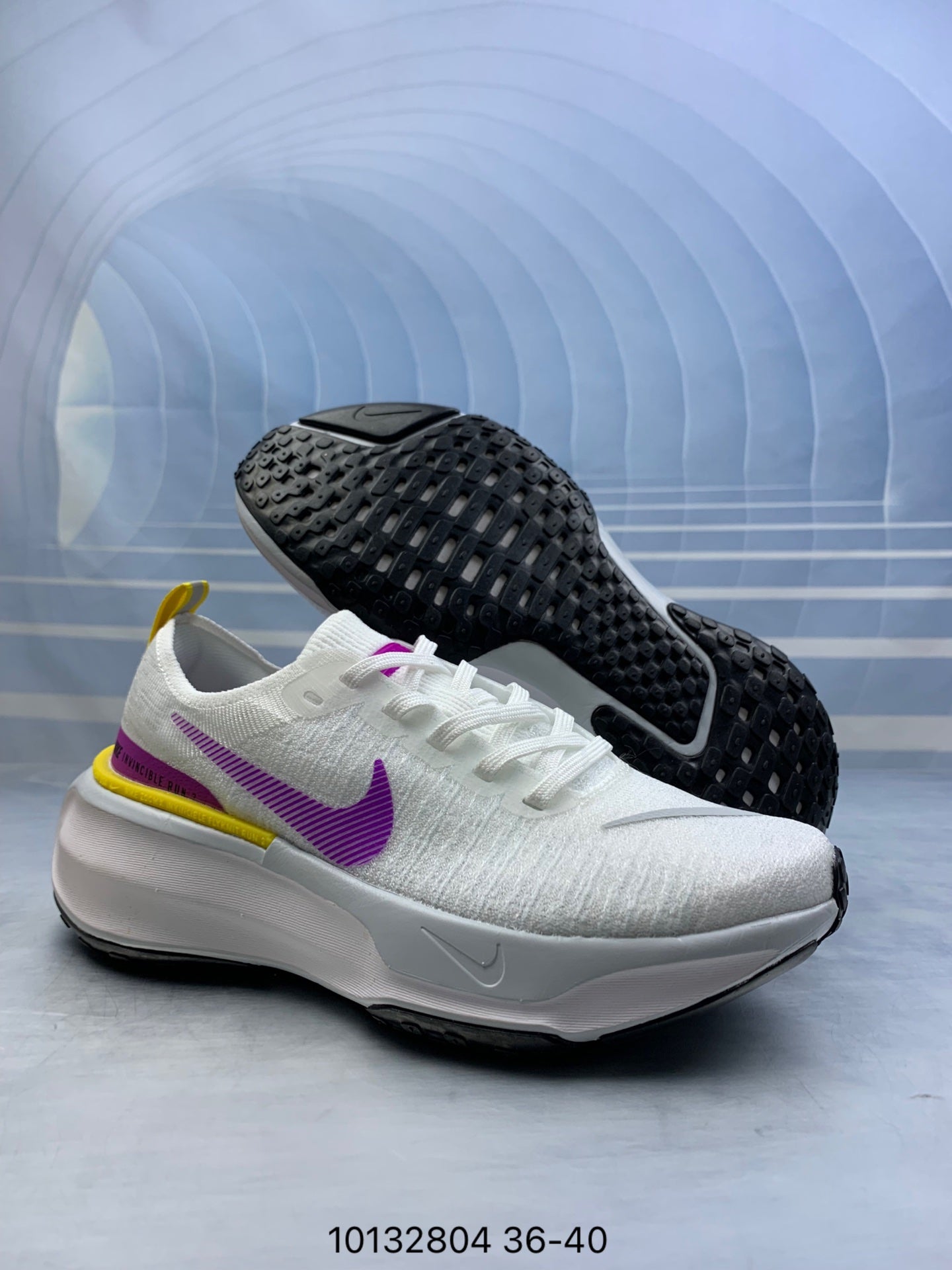 Nike Invincible 3.- blancas y moradas