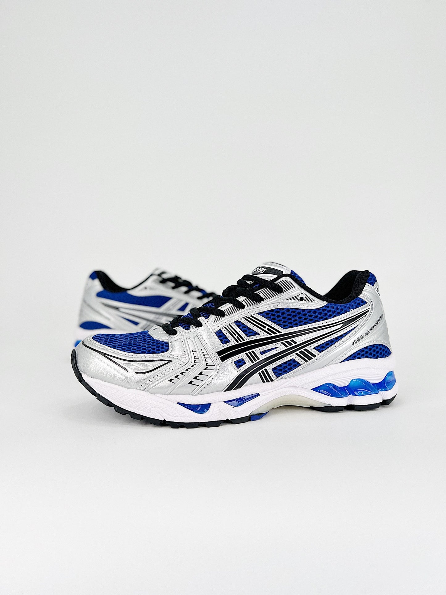 ASICS GEL-KAYANO 14.- negras y azules