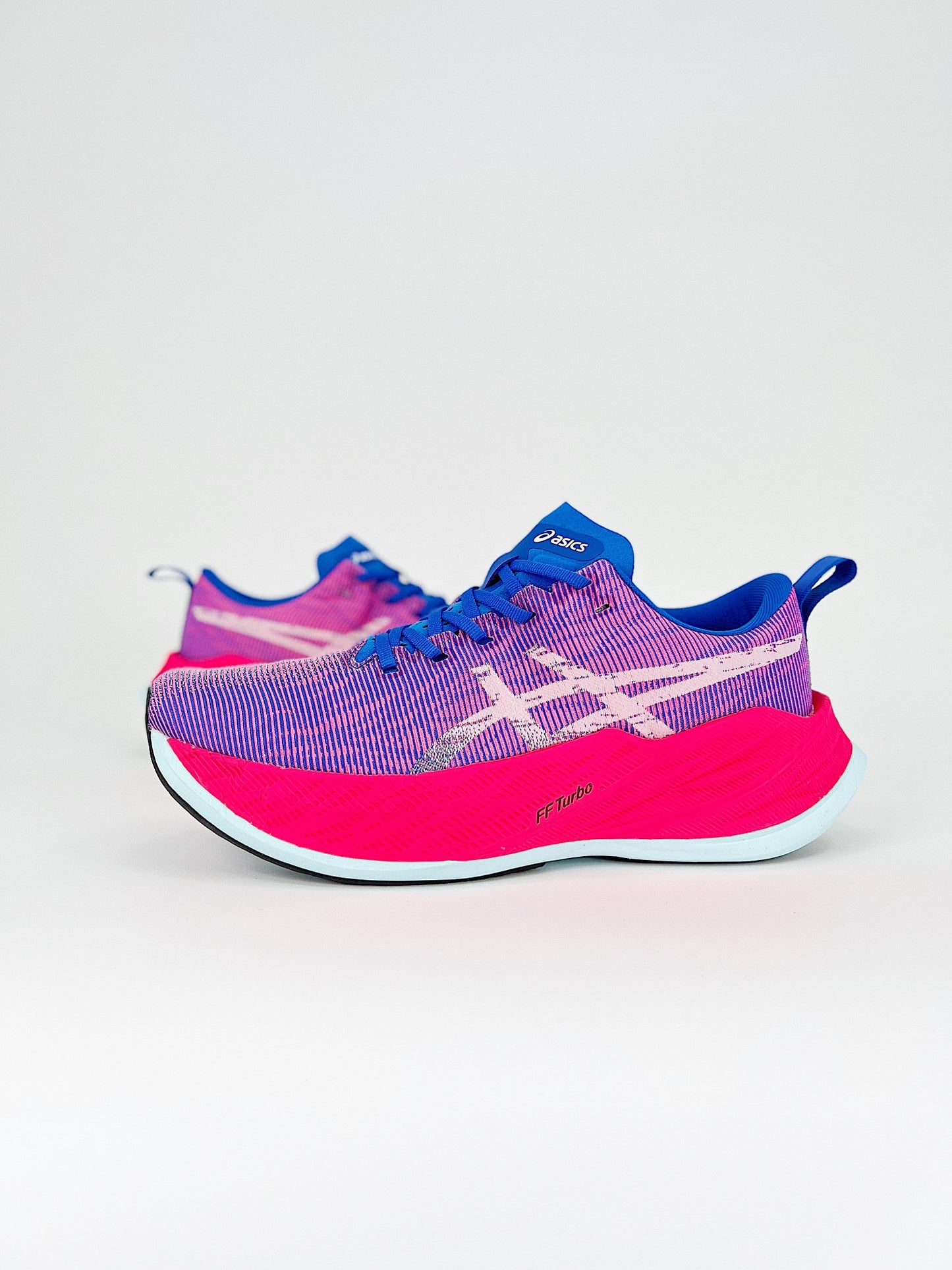 Asics Superblast.- rosas y moradas