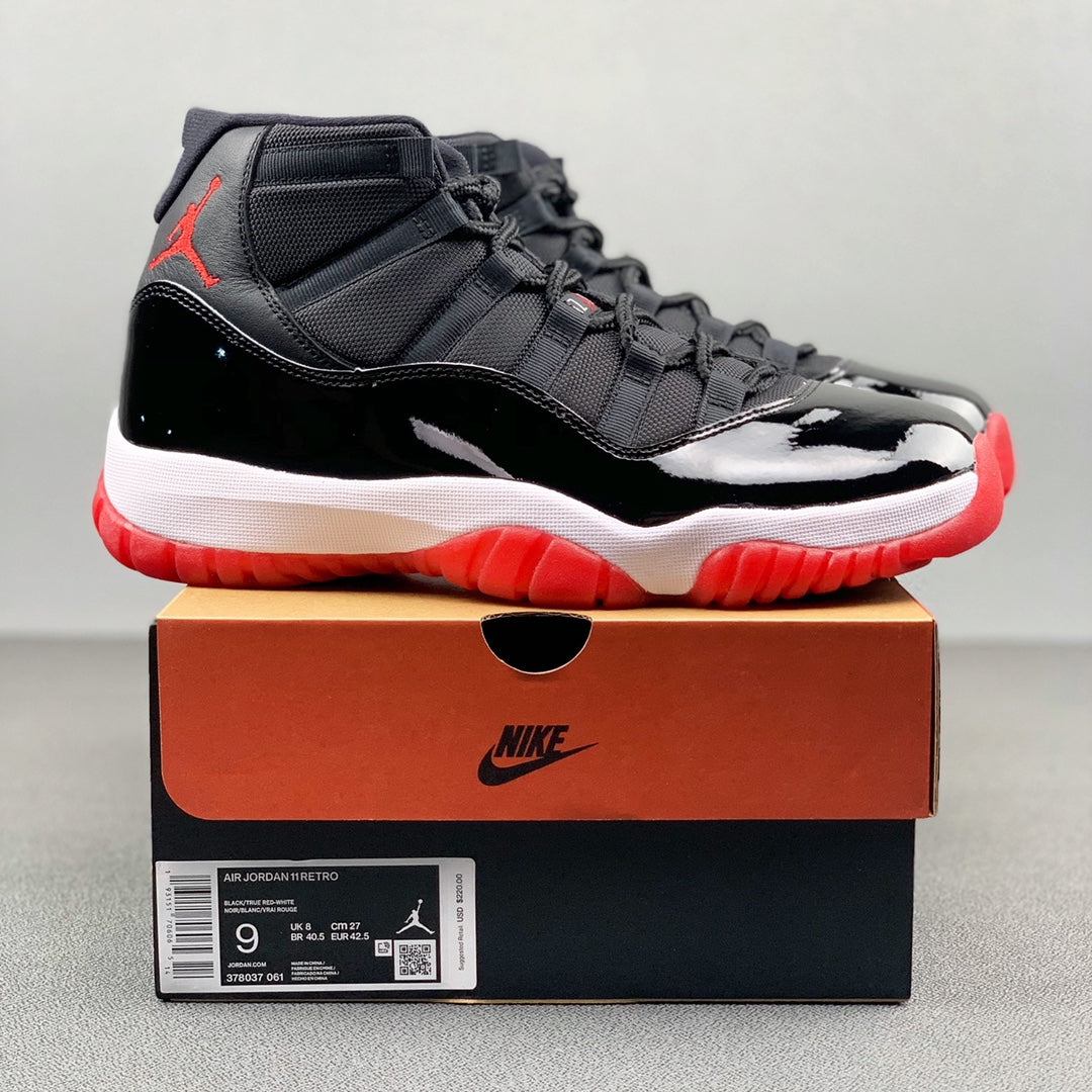 Air Jordan 11 "Bred" .- rojas y negras