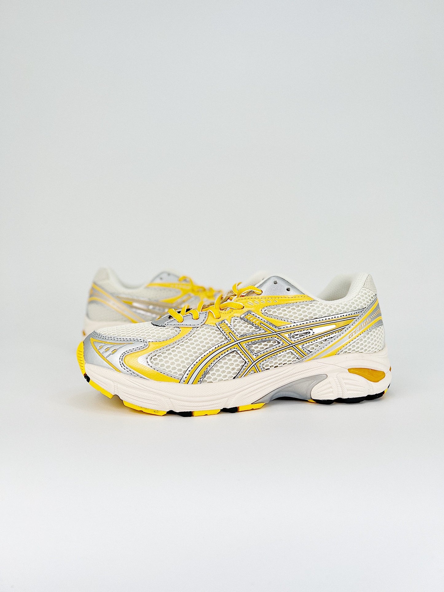 Asics GT-2160.- blancas y amarillas