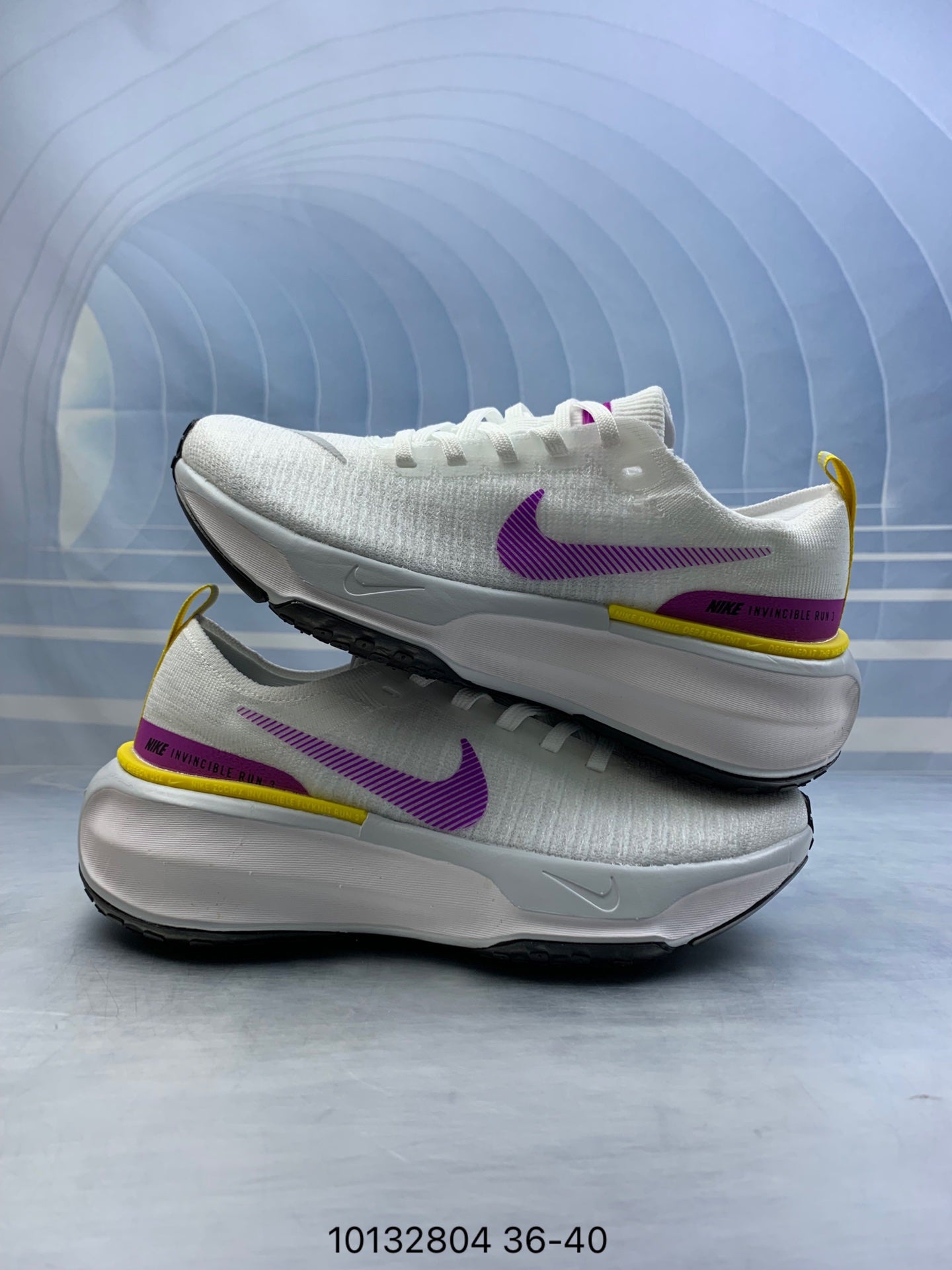 Nike Invincible 3.- blancas y moradas