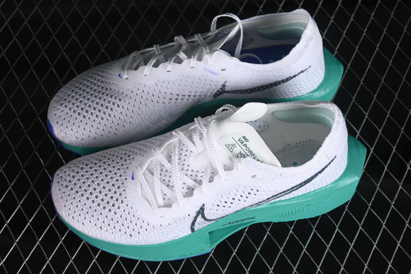 Nk ZoomX Vaporfly NEXT% 3 blanca y verde