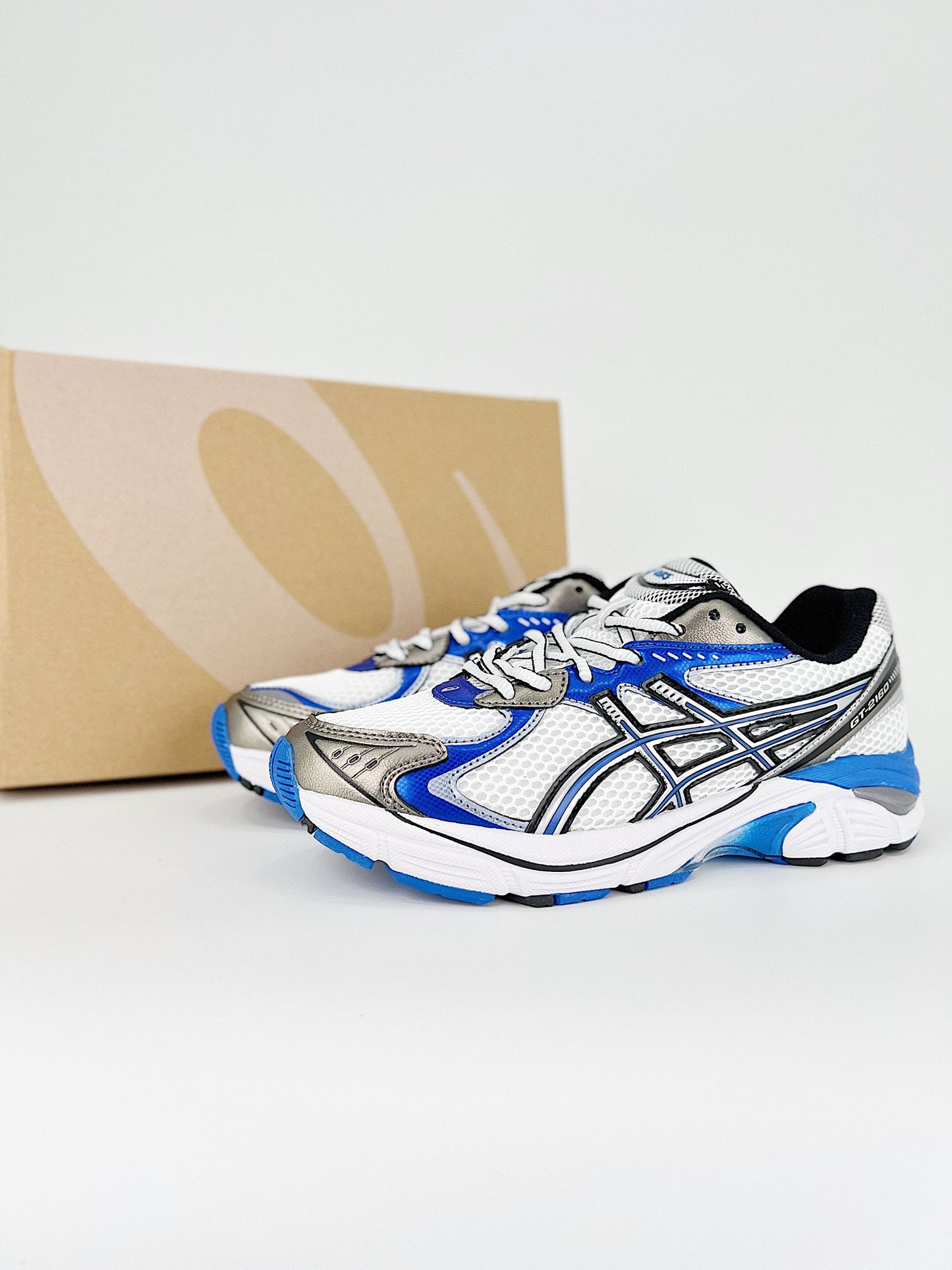 Asics GT-2160.- blancas, azules y negras