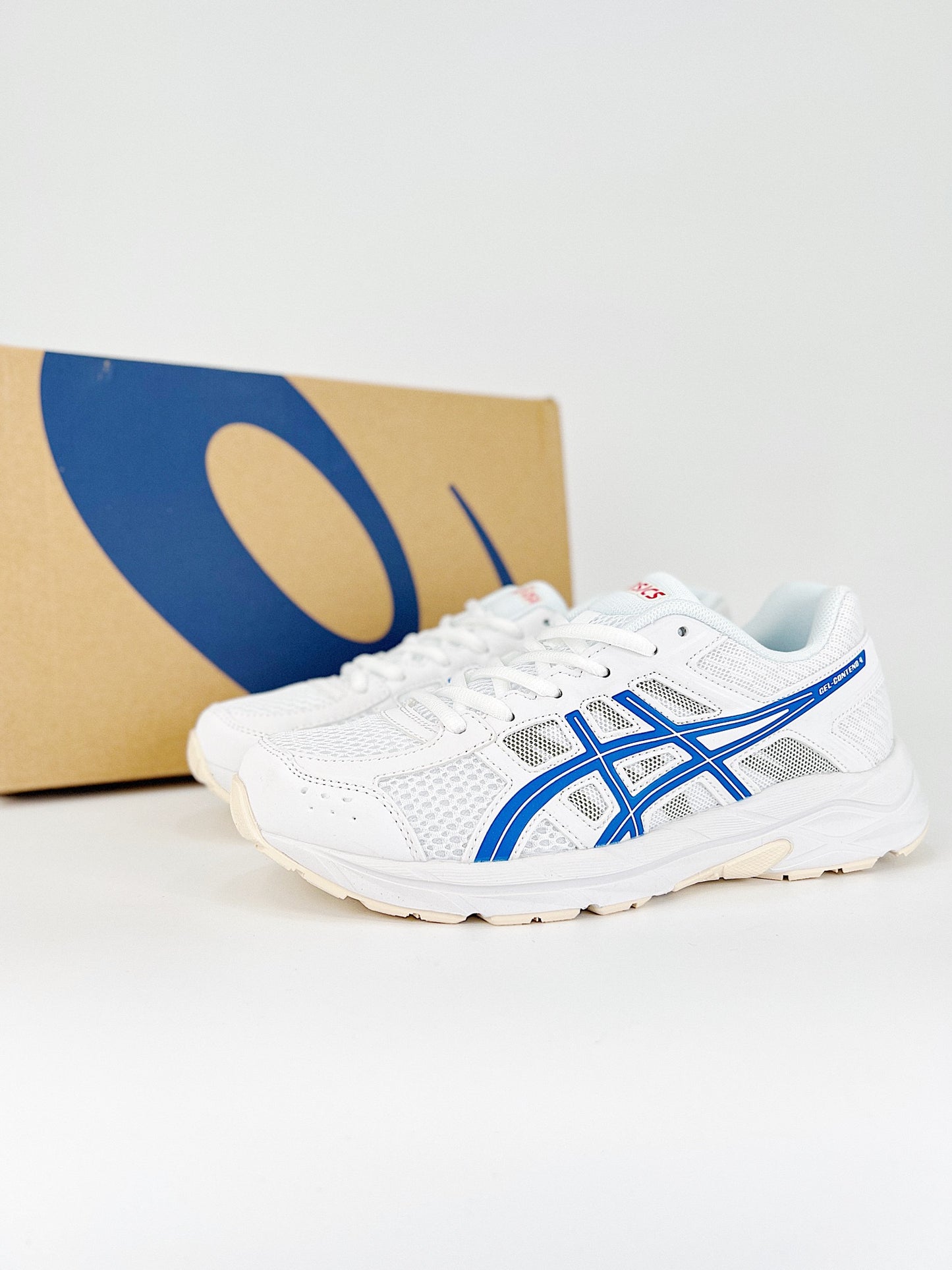 Asics Gel.- blancas y azules