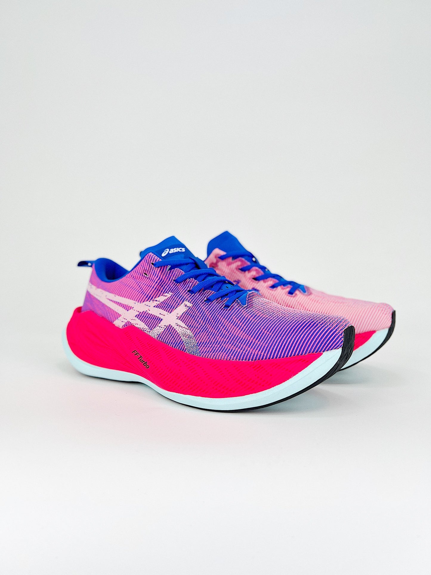 Asics Superblast.- rosas y moradas