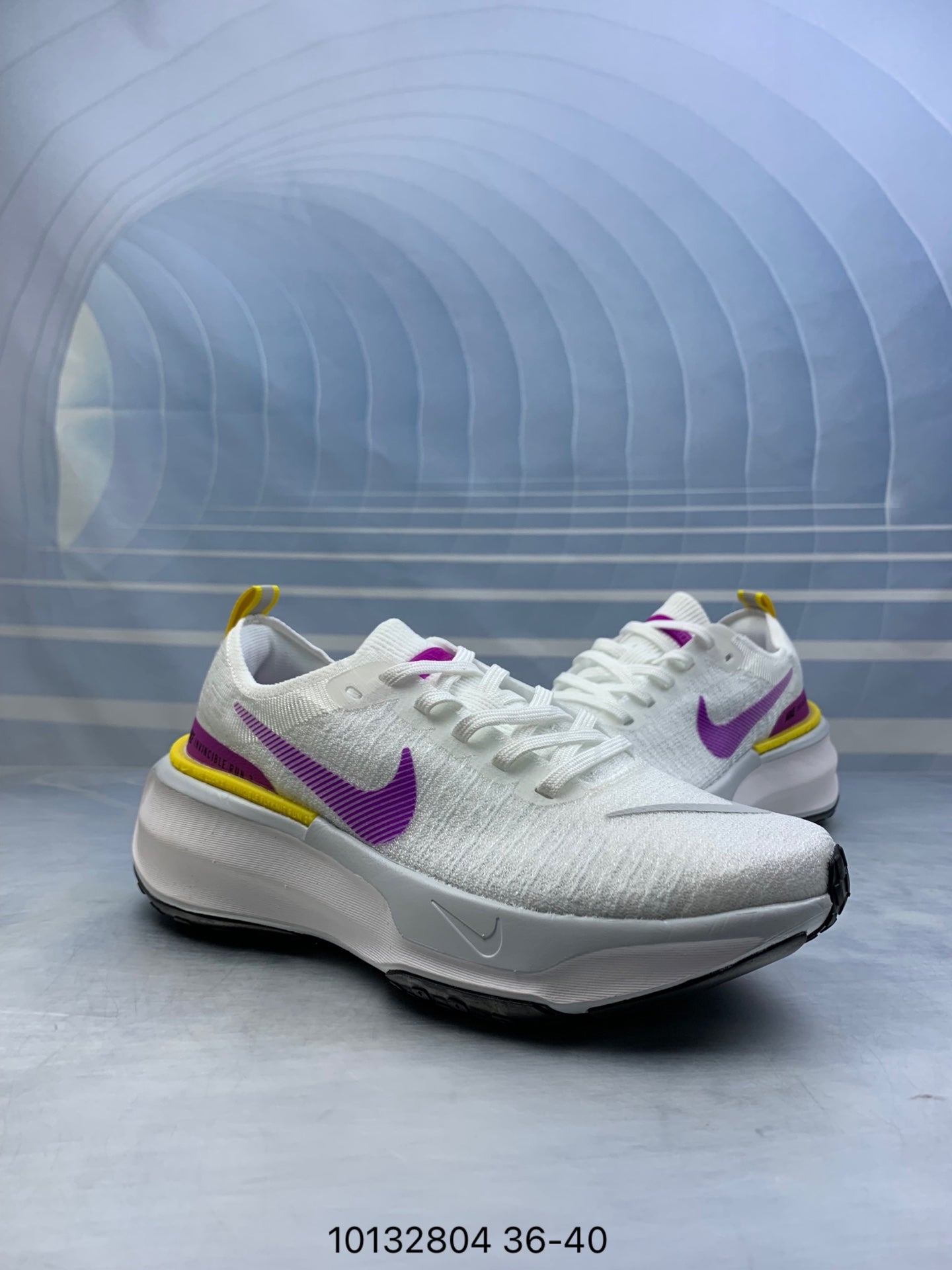 Nike Invincible 3.- blancas y moradas