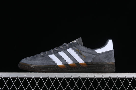 Adidas spezial.- gris y blancas