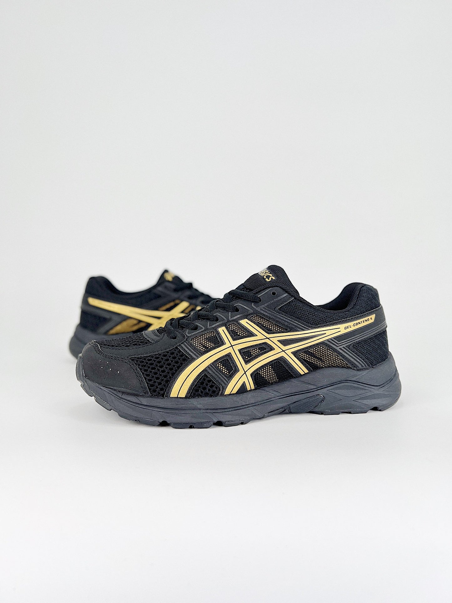 Asics Gel.- negras y amarillas