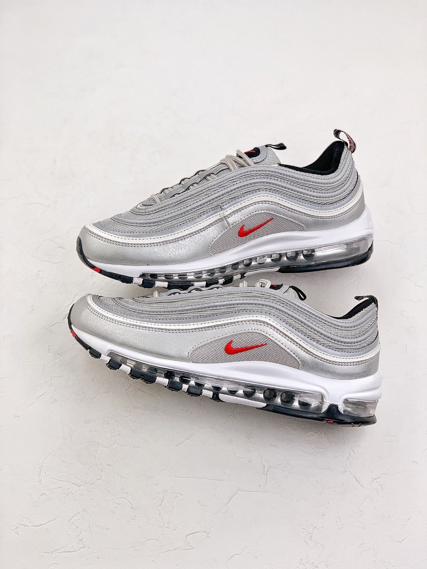 Nike Air Max 97.- grises