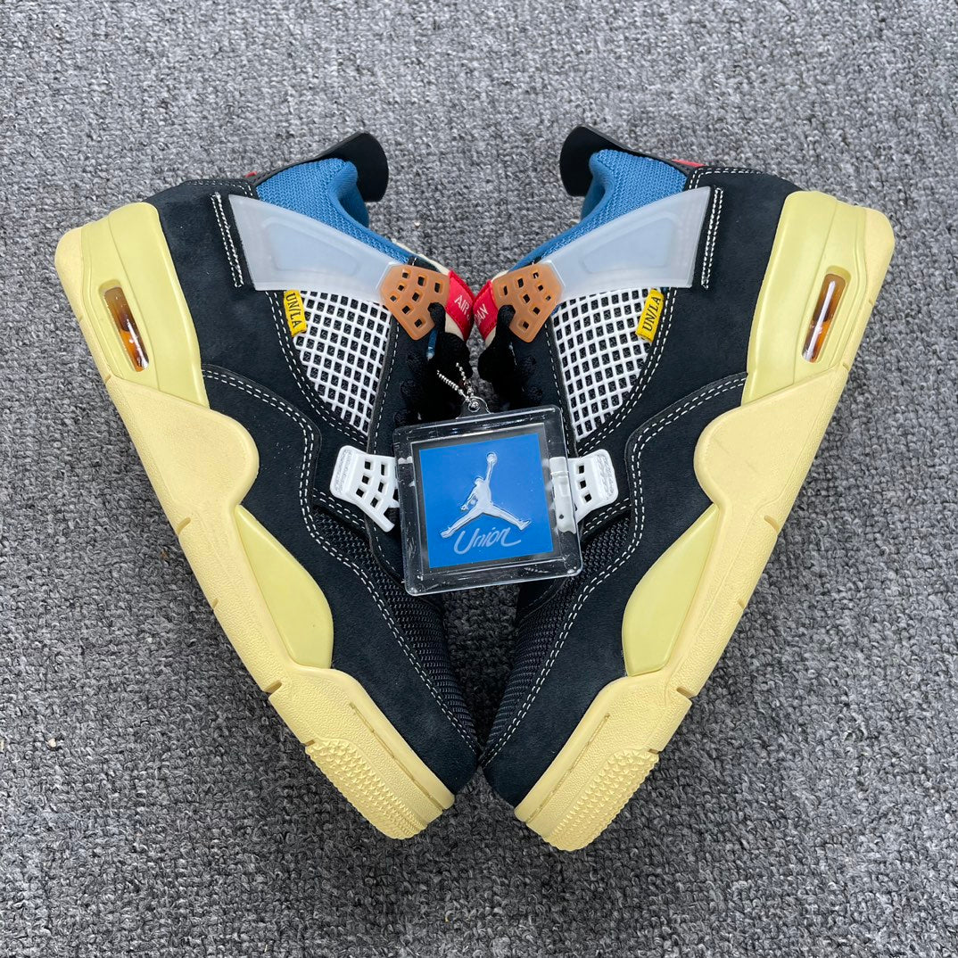 Air Jordan 4 Retro.- Union LA negras y azules